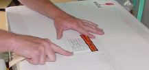An envelope
        containing your invoice and our return address is adhered to the top of the box.